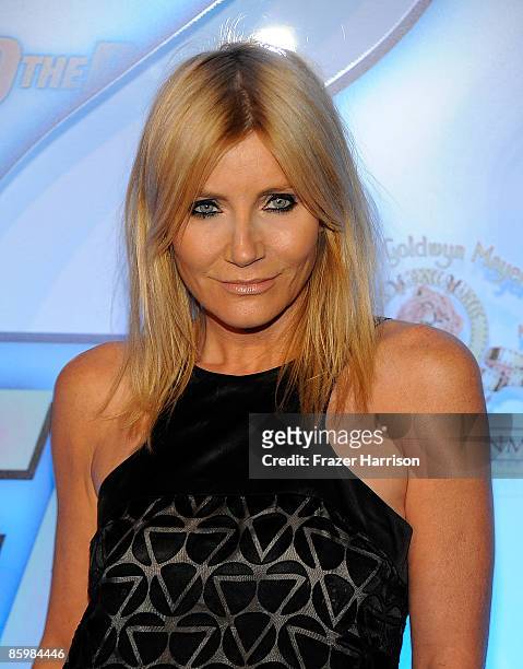 Actress Michelle Collins arrives at the premiere Of MGM Home Entertainment's "Into The Blue 2: The Reef" on April 14, 2009 at the poolside Beverly...