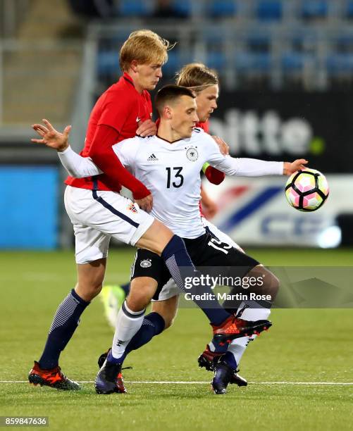 Morten Thorsby of Norway and Maximilian Eggestein of Germany battle for the ball during the UEFA Under21 Euro 2019 Qualifier match between U21 of...