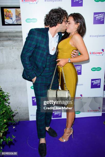 Kem Cetinay and Amber Davies during a photocall for Specsaver's Spectacle Wearer Of The Year at 8 Northumberland Avenue on October 10, 2017 in...