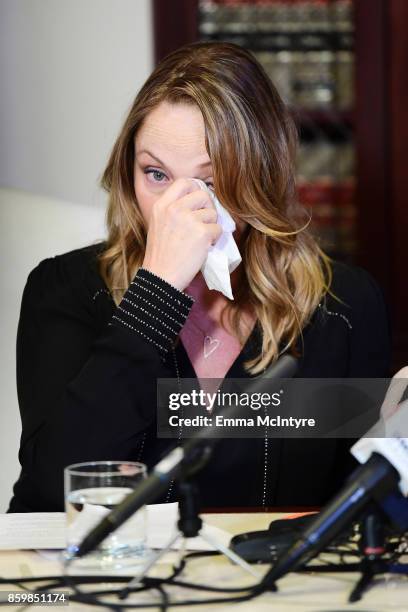 Attorney Gloria Allred's client Louisette Geiss speaks during a press conference about her allegations of sexual harassment by Harvey Weinstein at...