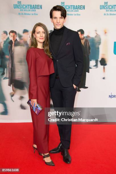 Alice Dwyer and Sabin Tambrea attend the premiere of 'Die Unsichtbaren' at Kino International on October 10, 2017 in Berlin, Germany.