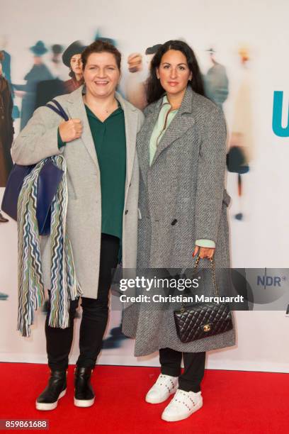 Minu Barati-Fischer and friend attends the premiere of 'Die Unsichtbaren' at Kino International on October 10, 2017 in Berlin, Germany.