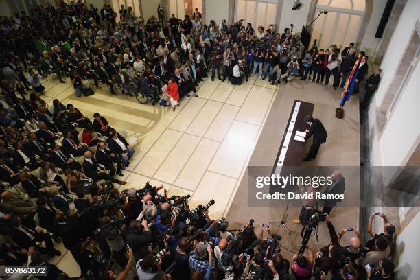 President of Catalonia, Carles Puigdemont, signs the Independence declaration signed by the Catalan governent and deputies at the Palau del Parlament...