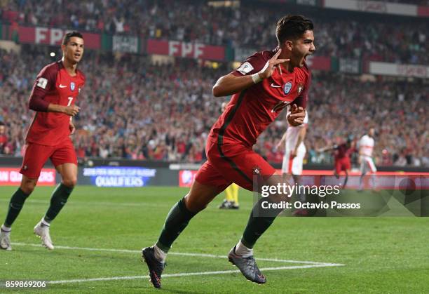Andre Silva of Portugal celebrates after scores the second goal against Switzerland during the FIFA 2018 World Cup Qualifier between Portugal and...