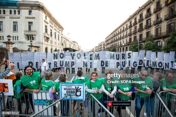 Catalan people are seen outside Parliament After the October 1 referendum and weeks of build up, Catalonia's president Carles Puigdemont will address...