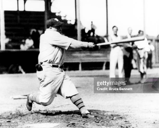 Hack Wilson of the Brooklyn Dodgers swings at the pitch before an MLB game circa 1932.
