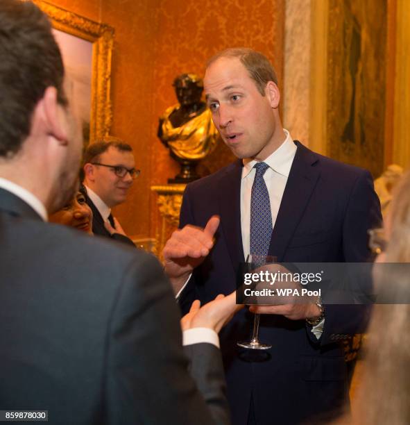 Prince William, Duke of Cambridge attends a reception on World Mental Health Day to celebrate the contribution of those working in the mental health...