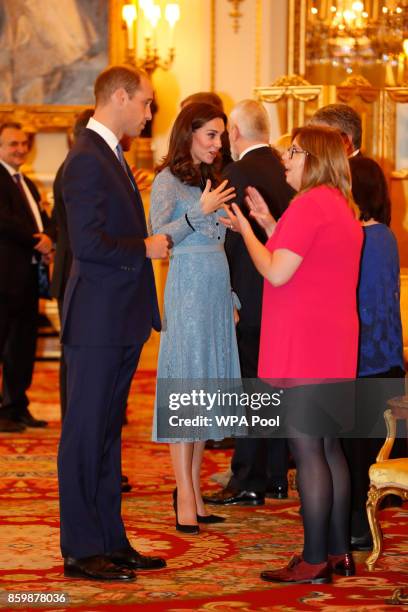 Prince William, Duke of Cambridge and Catherine, Duchess of Cambridge attend a reception on World Mental Health Day to celebrate the contribution of...