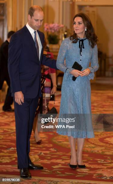 Prince William, Duke of Cambridge and Catherine, Duchess of Cambridge attend a reception on World Mental Health Day to celebrate the contribution of...