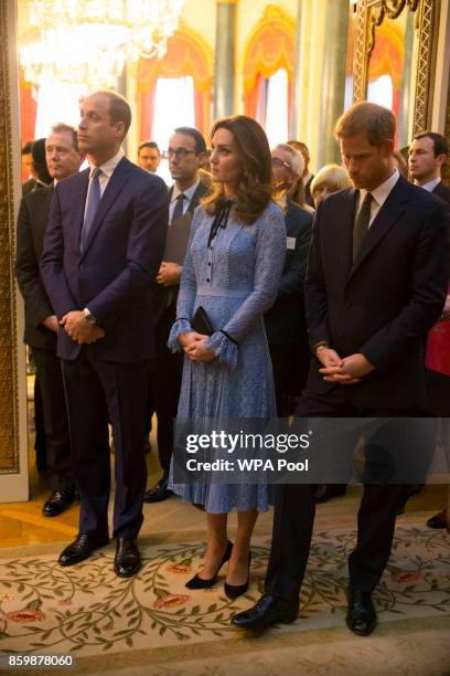 Prince William, Duke of Cambridge and Catherine, Duchess of Cambridge and Prince Harry attend a reception on World Mental Health Day to celebrate the...