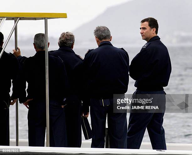Spain's Prince Felipe looks on during a simulated sea rescue operation at the Military Base of Pollensa on Mallorca Island on April 15, 2009. Prince...