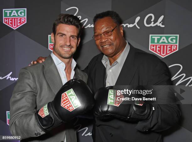 Aitor Ocio and Larry Holmes attend the launch of the TAG Heuer Muhammad Ali Limited Edition Timepieces at BXR Gym on October 10, 2017 in London,...