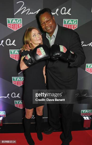Geri Horner and Larry Holmes attend the launch of the TAG Heuer Muhammad Ali Limited Edition Timepieces at BXR Gym on October 10, 2017 in London,...