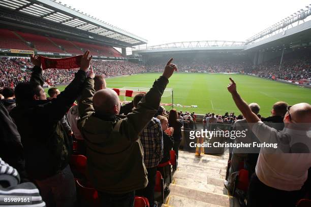 Packed Anfield stadium sing' You'll Never Walk Alone' during the Hillsborough memorial at Anfield on April 15 Liverpool, England. Thousands of fans,...