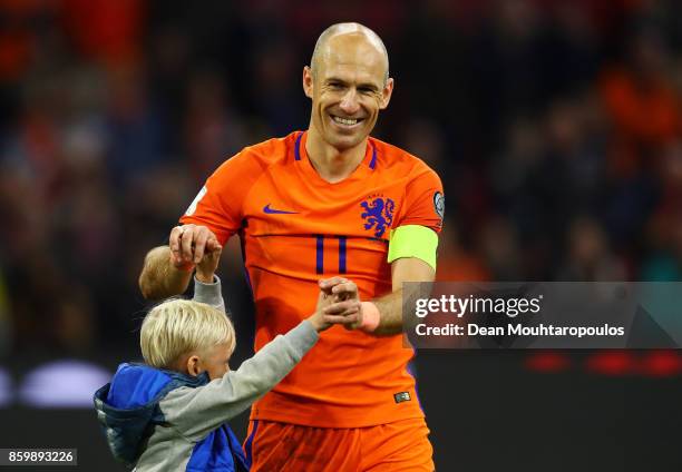 Arjen Robben of Netherlands smiles with his children after the FIFA 2018 World Cup Qualifier between Netherlands and Sweden at the Amsterdam Arena on...