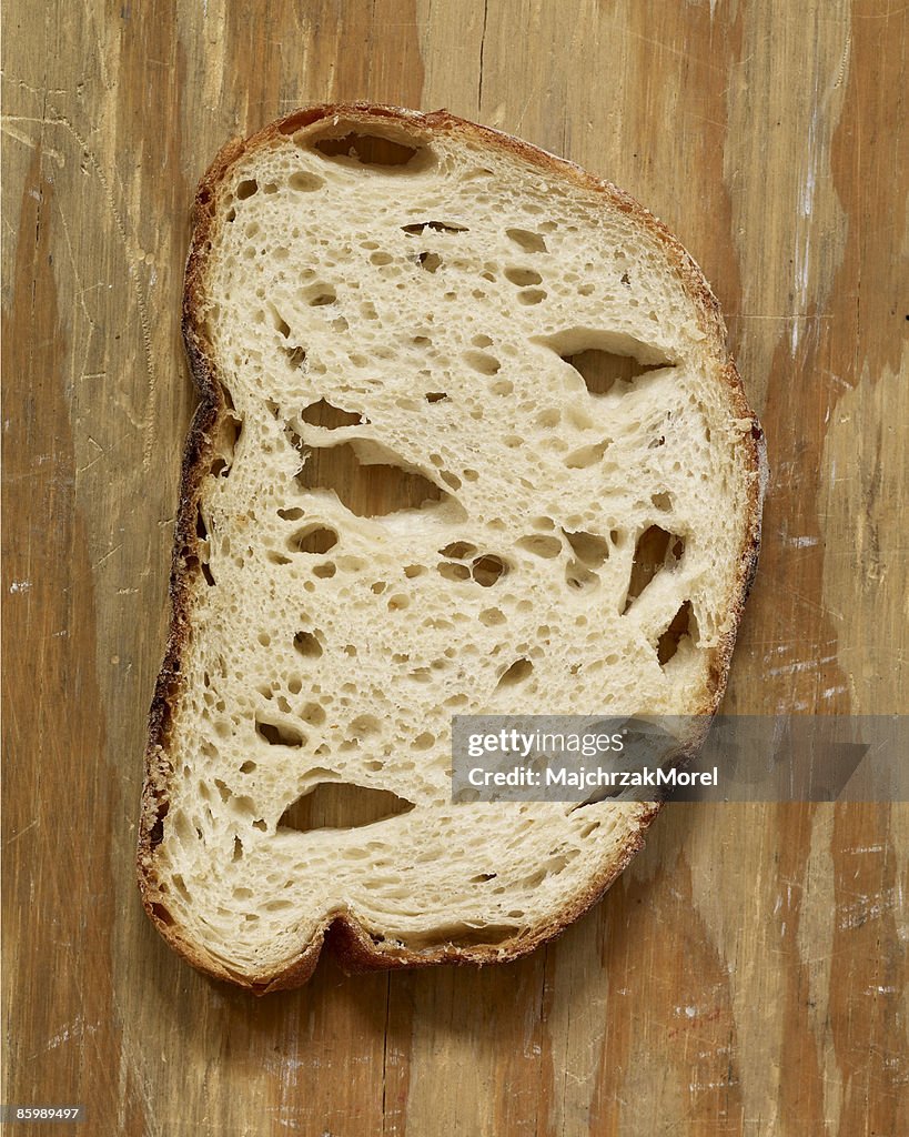 Bread Slice on Distressed Wood