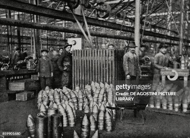 Machining of medium caliber grenades in an ammunition factory, Italy, World War I, from L'Illustrazione Italiana, Year XLIII, No 14, April 2, 1916.