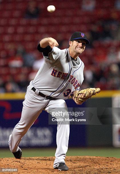 Mike Pelfrey of the New York Mets pitches against the Cincinnati Reds on April 8, 2009 at Great American Ballpark in Cincinnati, Ohio. The Mets won...