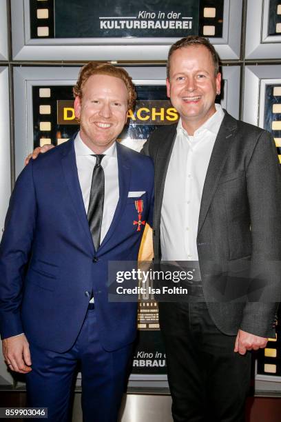 Violinist Daniel Hope, and German politician Klaus Lederer attend the premiere of 'Der Klang des Lebens' at Kino in der Kulturbrauerei on October 10,...