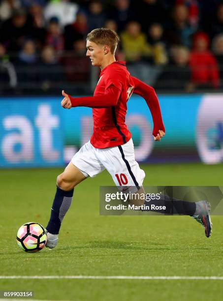 Martin Oedegaard of Norway runs with the ball during the UEFA Under21 Euro 2019 Qualifier match between U21 of Norway and U21 of Germany at...