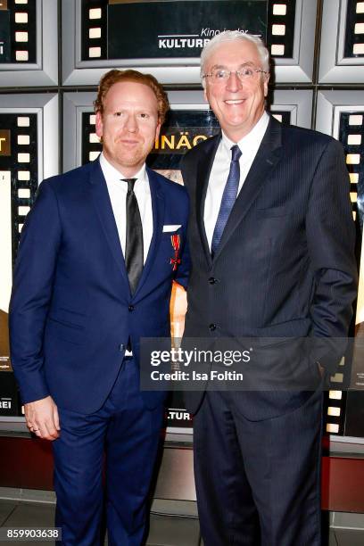 Violinist Daniel Hope and Irish ambassador Michael Collins attend the premiere of 'Der Klang des Lebens' at Kino in der Kulturbrauerei on October 10,...