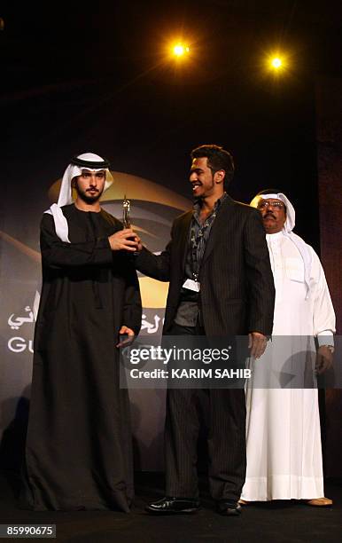 Sheikh Majid bin Mohammed bin Rashid , chairman of the Dubai Culture and Arts Authority, presents Saudi director Walid Osman with the second prize...