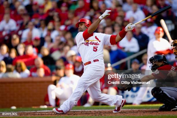 Albert Pujols of the St. Louis Cardinals hits a home run against the Houston Astros on April 11, 2009 at Busch Stadium in St. Louis, Missouri. The...