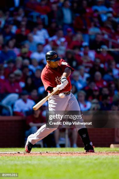 Carlos Lee of the Houston Astros bats against the St. Louis Cardinals on April 11, 2009 at Busch Stadium in St. Louis, Missouri. The Cardinals...