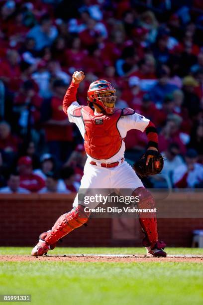 Yadier Molina of the St. Louis Cardinals throws to second base against the Houston Astros on April 11, 2009 at Busch Stadium in St. Louis, Missouri....