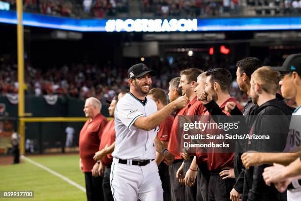 Adam Rosales of the Arizona Diamondbacks is introduced prior to the National League Wild Card game between the Arizona Diamondbacks and Colorado...