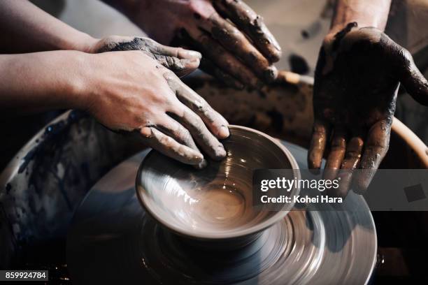 hands of woman learning ceramic art - japan training session stock pictures, royalty-free photos & images