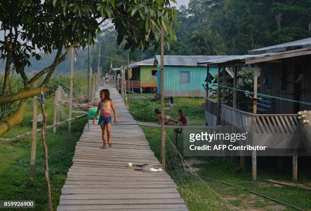 Child walks in a village near the village of Volta do Bucho which has benefited from a water pump powered by solar energy and installed by the World...