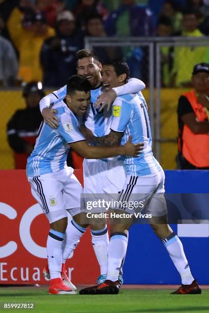 Lionel Messi of Argentina celebrates with teammates after scoring the second goal of his team during a match between Ecuador and Argentina as part of...