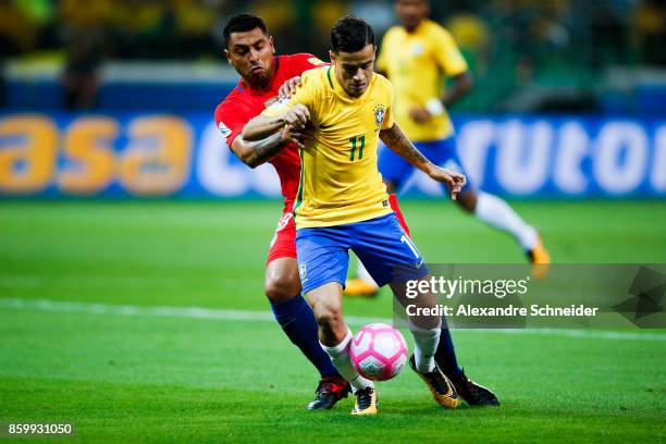 Gonzalo Jara of Chile and Philippe Coutinho of Brazil in action during the match between Brazil and Chile for the 2018 FIFA World Cup Russia...