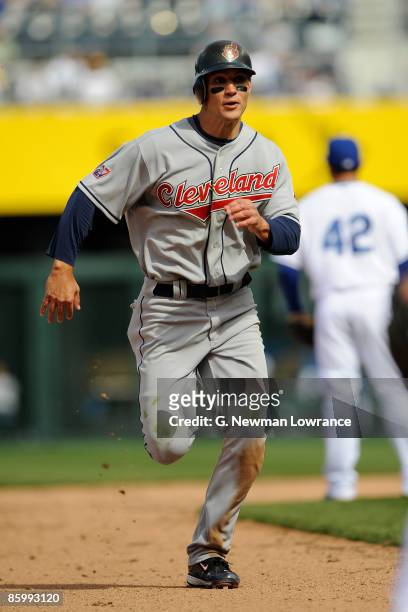 Grady Sizemore of the Cleveland Indians, wearing a jersey during the Jackie Robinson Day game runs to third base against the Kansas City Royals on...