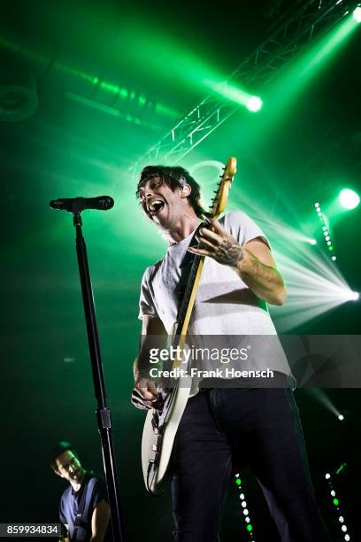 Singer Alex Gaskarth of the American band All Time Low performs live on stage during a concert at the Huxleys on October 10, 2017 in Berlin, Germany.