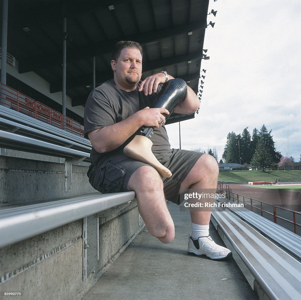 Portrait of former NFL Raiders player Curt Marsh in the bleachers of ...
