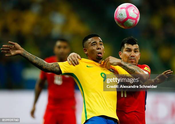 Gabriel Jesus of Brazil and Gary Medel of Chile in action during the match between Brazil and Chile for the 2018 FIFA World Cup Russia Qualifier at...