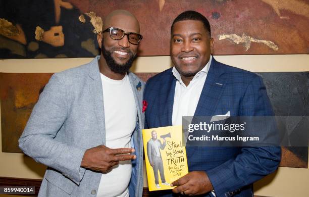 Comedian and author Rickey Smiley and Dr. E. Dewey Smith attends The House Of Hope Atlanta to promote Rickey Smiley's book tour 'Stand By Your Truth'...