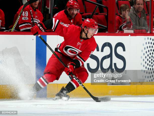 Janne Kuokkanen of the Carolina Hurricanes corrals a loose puck during an NHL game against the Columbus Blue Jackets on October 10, 2017 at PNC Arena...