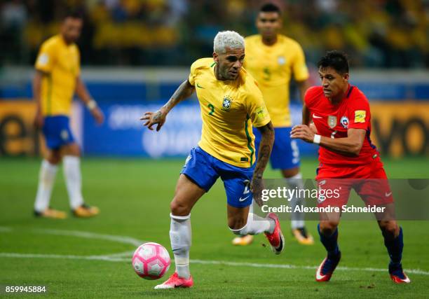 Daniel Alves of Brazil and Alexis Sanches of Chile in action during the match between Brazil and Chile for the 2018 FIFA World Cup Russia Qualifier...