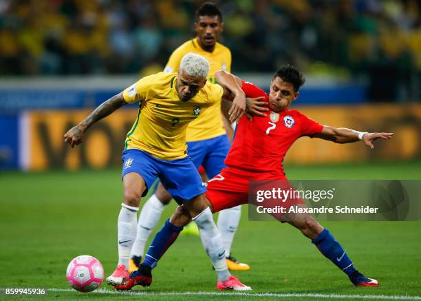 Daniel Alves of Brazil and Alexis Sanches of Chile in action during the match between Brazil and Chile for the 2018 FIFA World Cup Russia Qualifier...