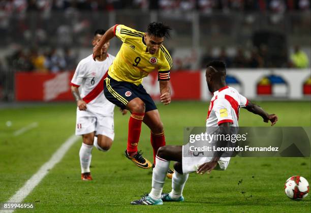 Radamel Falcao of Colombia struggles for the ball with Christian Ramos of Peru during match between Peru and Colombia as part of FIFA 2018 World Cup...