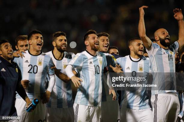Lionel Messi celebrates with his teammates qualifying to the World Cup after winning a match between Ecuador and Argentina as part of FIFA 2018 World...