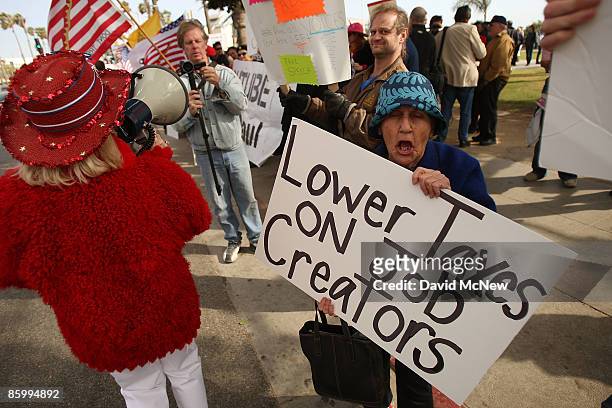 Lenore Grossman demonstrates at an American Family Association -sponsored T.E.A. Party to protest taxes and economic stimulus spending on the last...