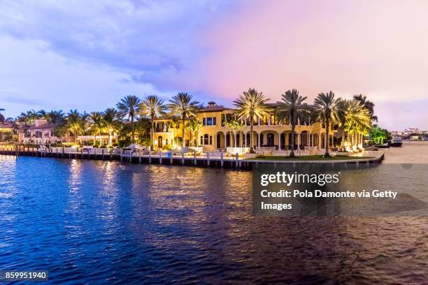 sunset at fort lauderdale canals. luxury yachts in las olas boulevard, florida, usa - boulevard strand stock-fotos und bilder