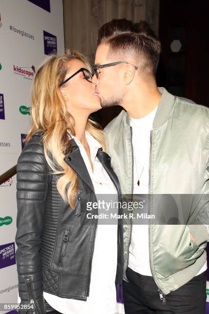 Olivia Attwood and Chris Hughes attending the Specsavers 'Spectacle Wearer of the Year' awards on October 10, 2017 in London, England.