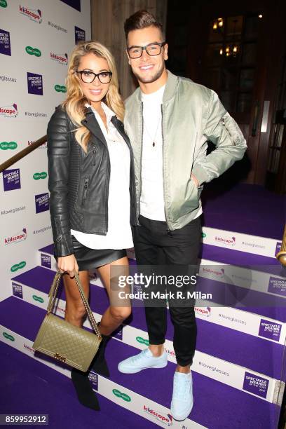 Olivia Attwood and Chris Hughes attending the Specsavers 'Spectacle Wearer of the Year' awards on October 10, 2017 in London, England.