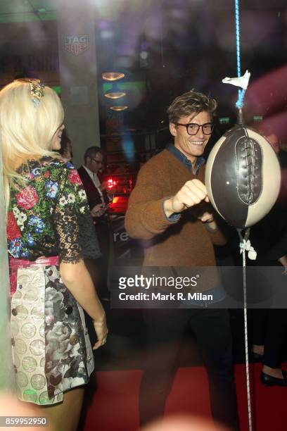 Oliver Cheshire and Pixie Lott attending the Muhammad Ali Tag Heuer launch party on October 10, 2017 in London, England.