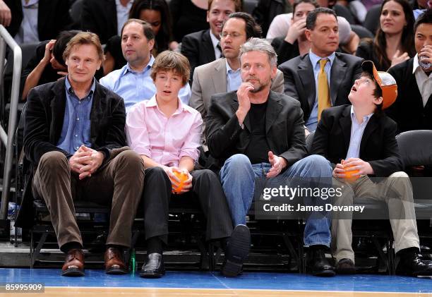 Liam Neeson, Michael Neeson, Aidan Quinn and Daniel Neeson attend New Jersey Nets vs New York Knicks game at Madison Square Garden on April 15, 2009...